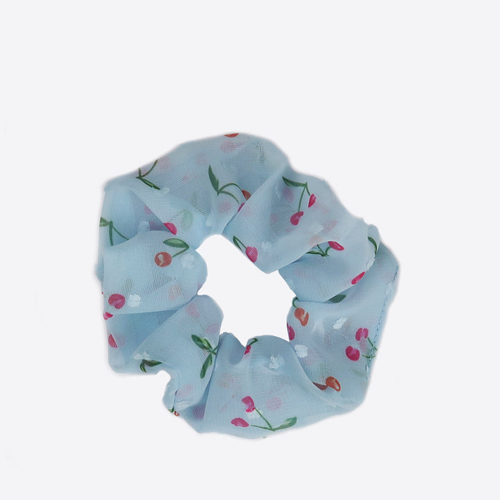 Sistie Scrunchie in blue with small sweet cherries